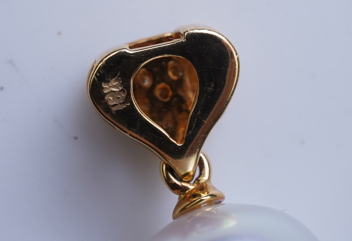 A cultured pearl and diamond pendant